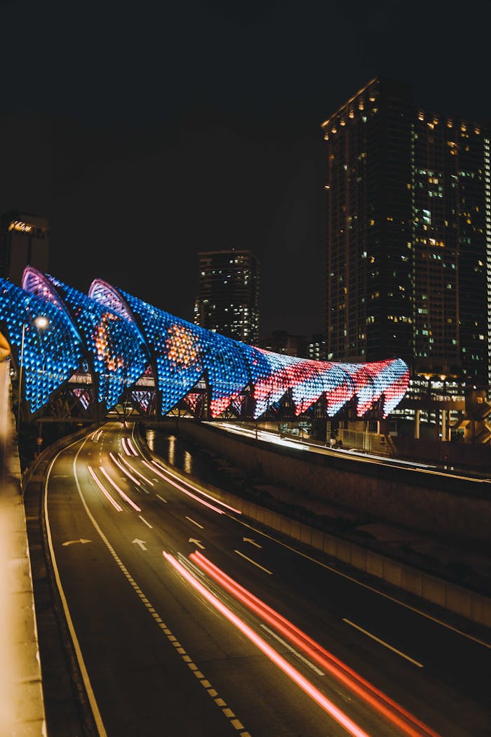 A bridge with lights on it at night